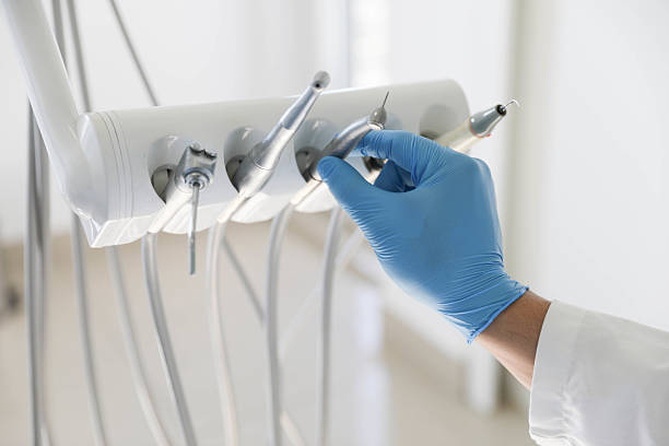 Professional Emergency Dentist technician working in Gladewater, TX